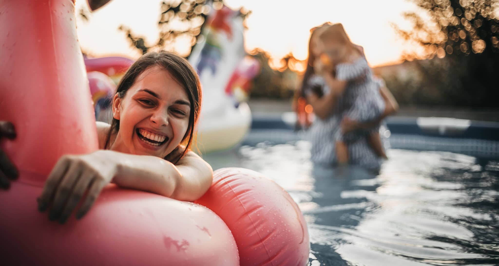 Girl and flamingos rubber pool