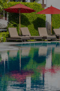 beautiful-umbrella-chair-around-outdoor-swimming-pool-hotel-resort-holiday-vacation